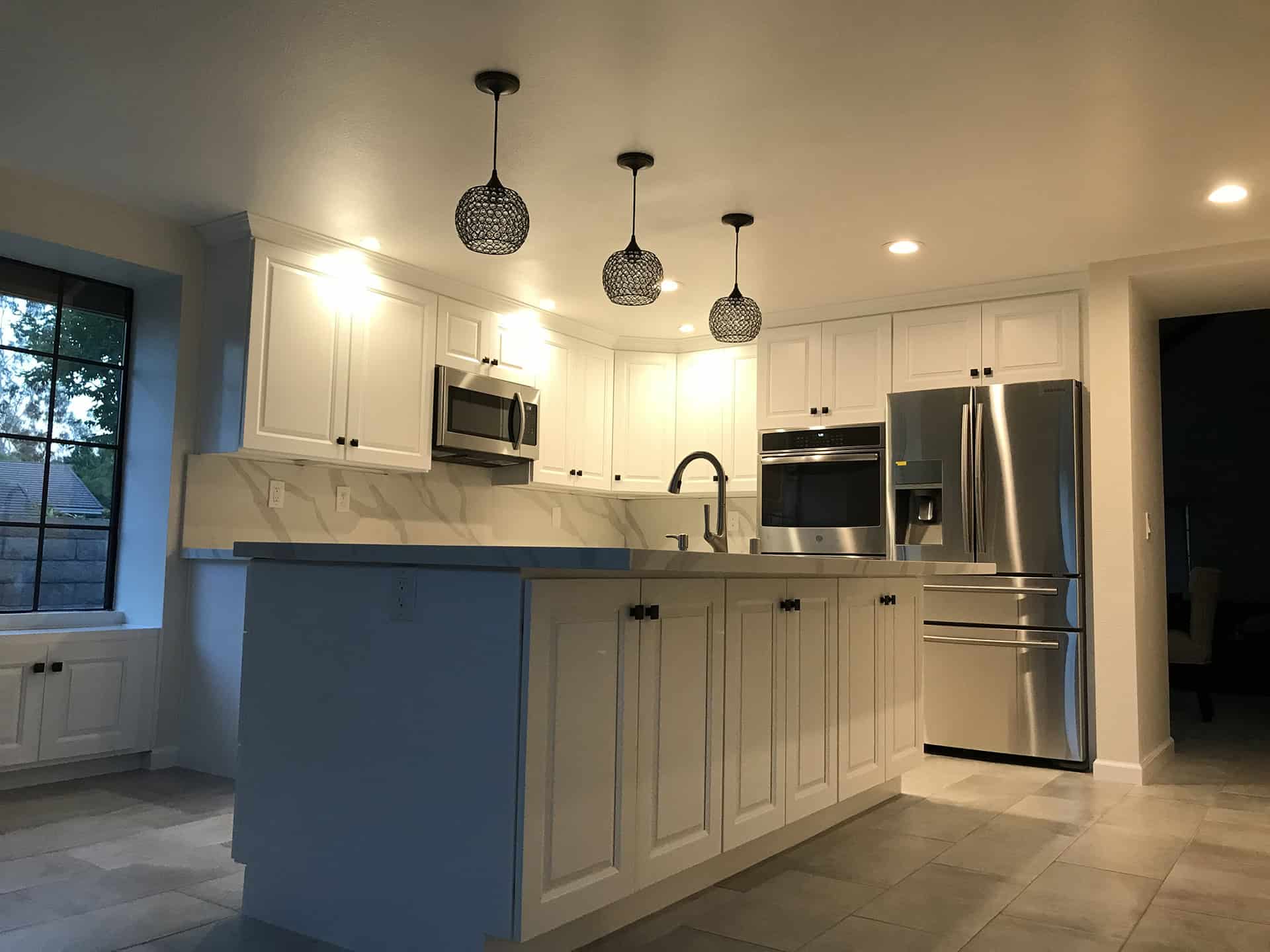 Modern Kitchen Remodel with Central Island in Whit | Groysman Construction Remodeling | 2