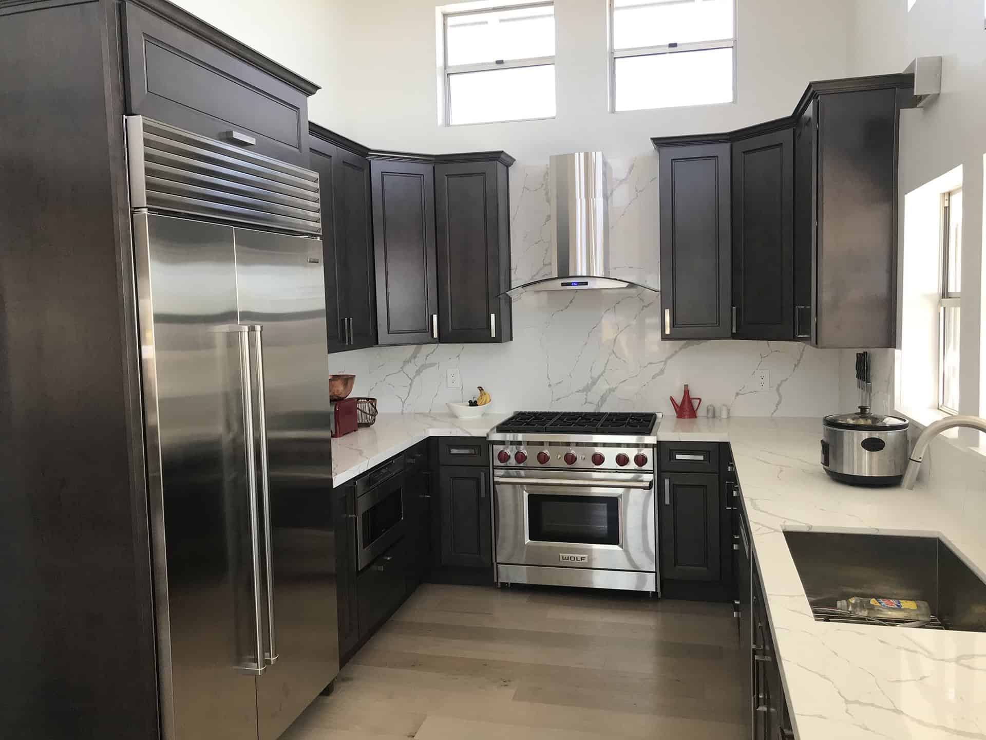 Modern Kitchen Remodel with Central Island in White | Groysman Construction Remodeling | 3
