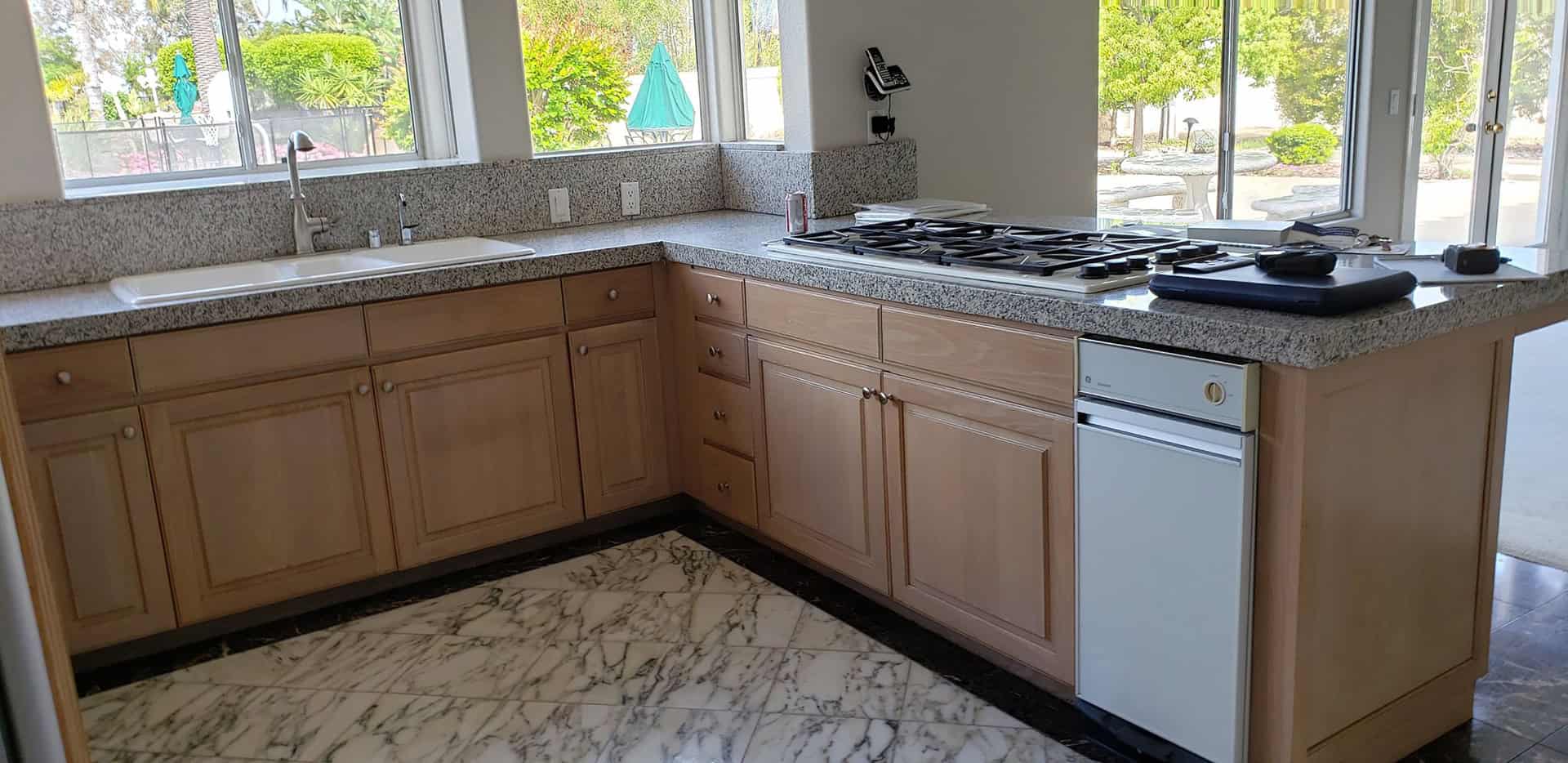 a beige corner kitchen