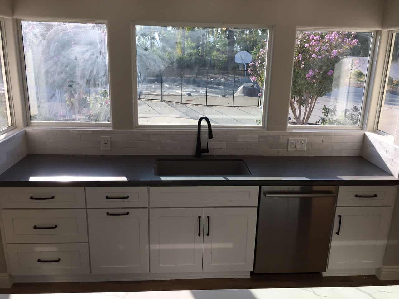 white kitchen fronts with black hardware