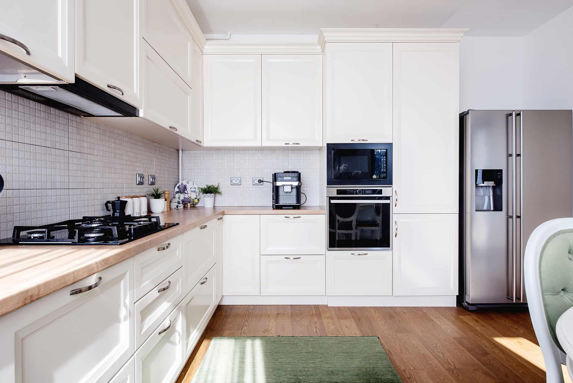 white l-shaped kitchen