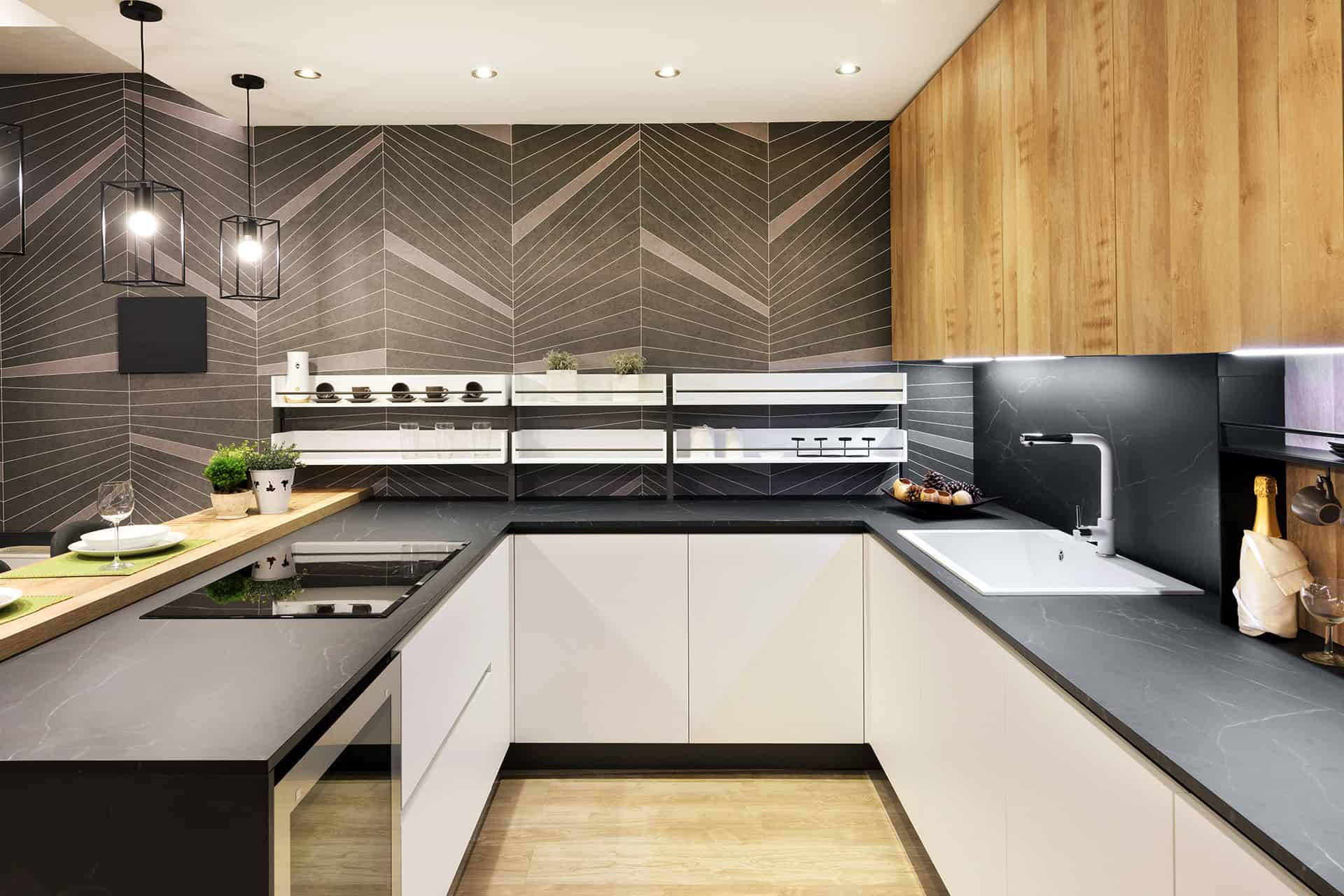 modern u-shaped kitchen with white cabinets and wood accents