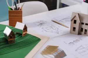 architect’s project and a miniature house model
