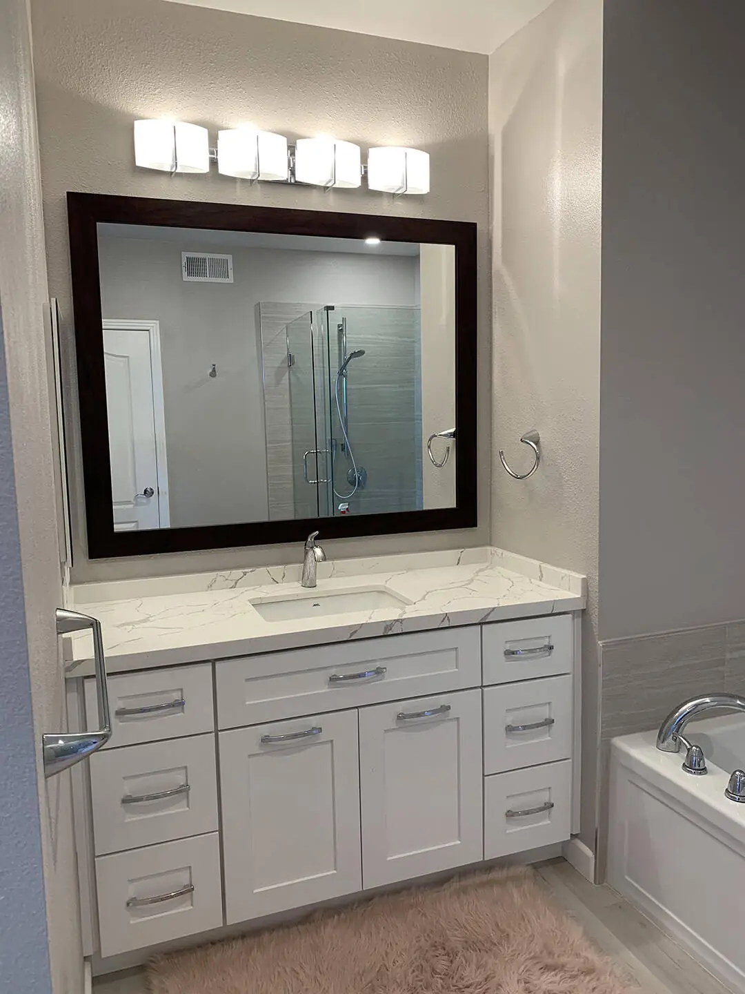 sink with mirror in black frame