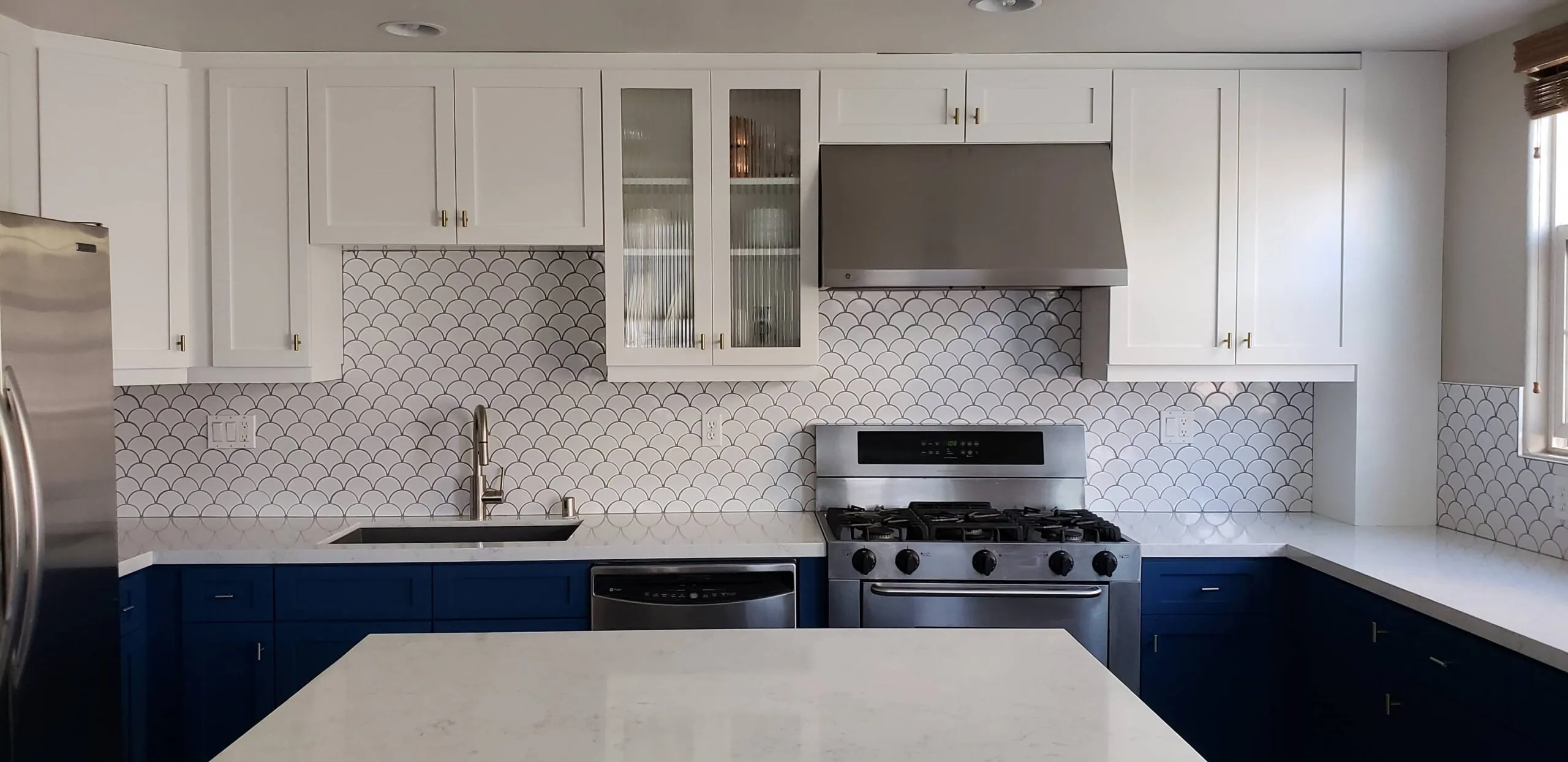 Modern Kitchen Remodel with Central Island in White | Groysman Construction Remodeling | 1