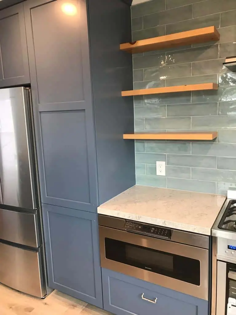 grey kitchen with closed and open shelves