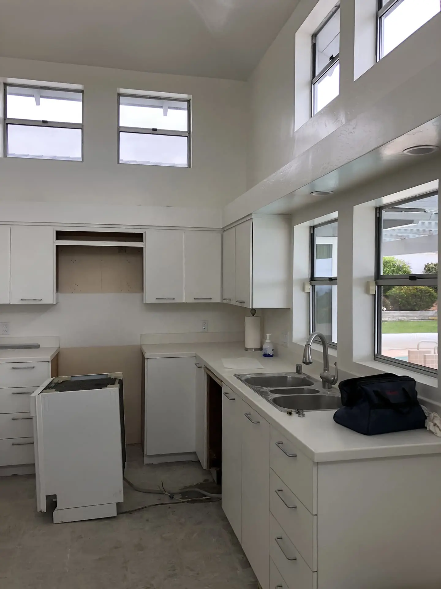 white kitchen with windows