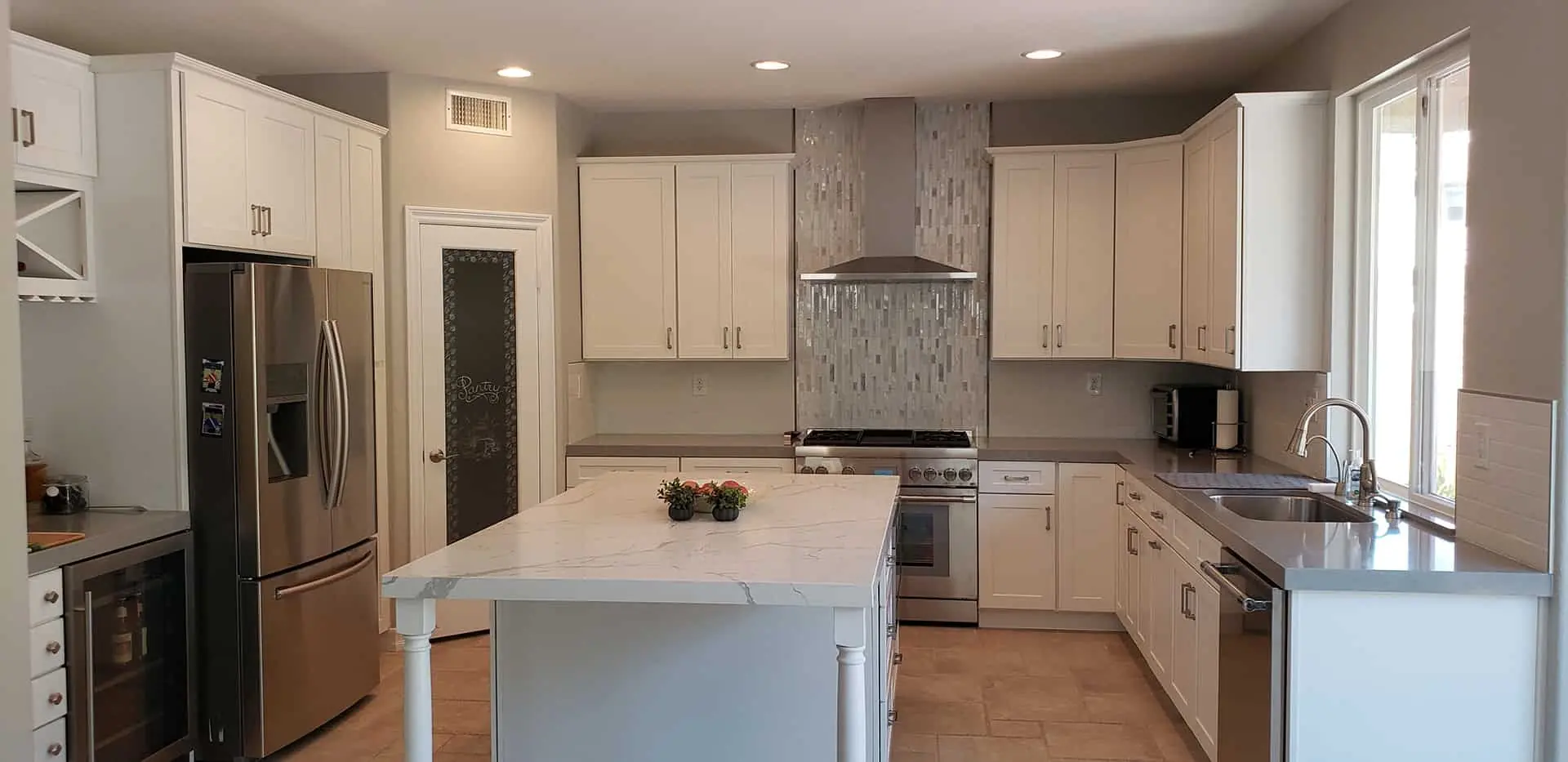 white kitchen with an island