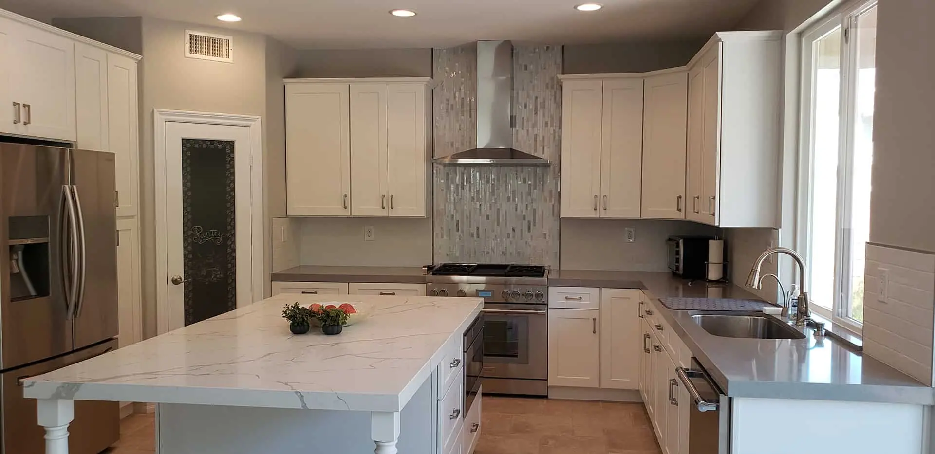 renovated kitchen with a gray sink