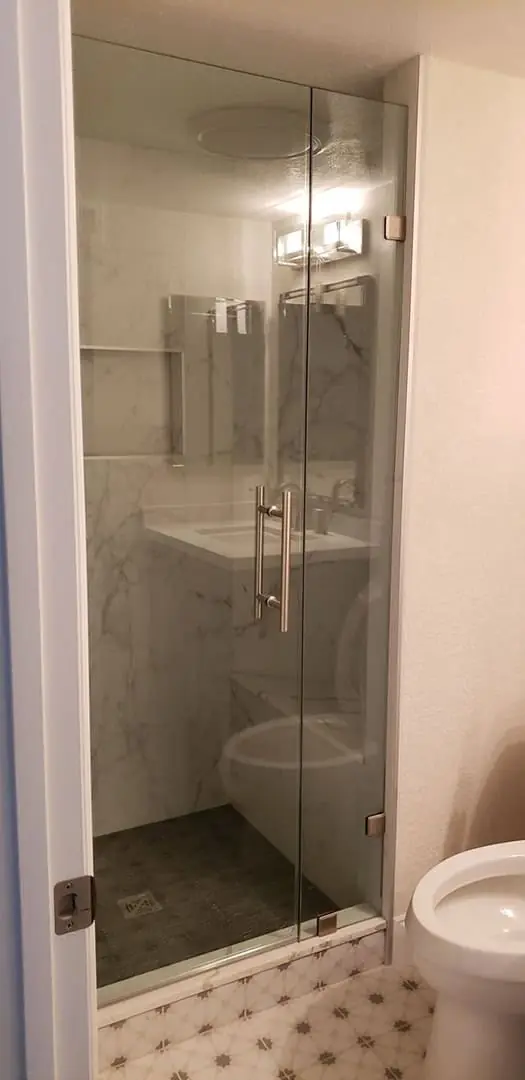 shower with marble tiles