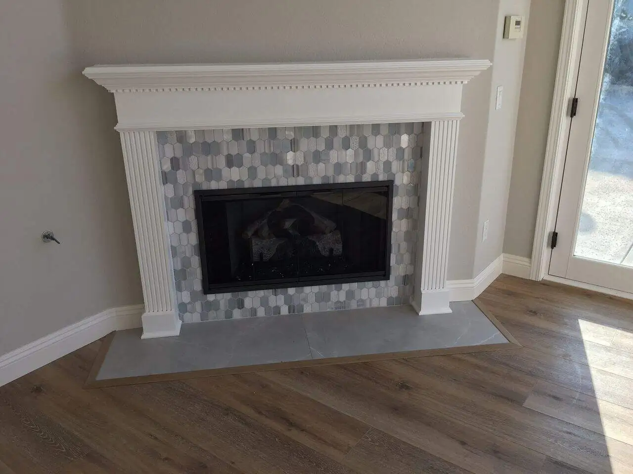 a fireplace in gray tones