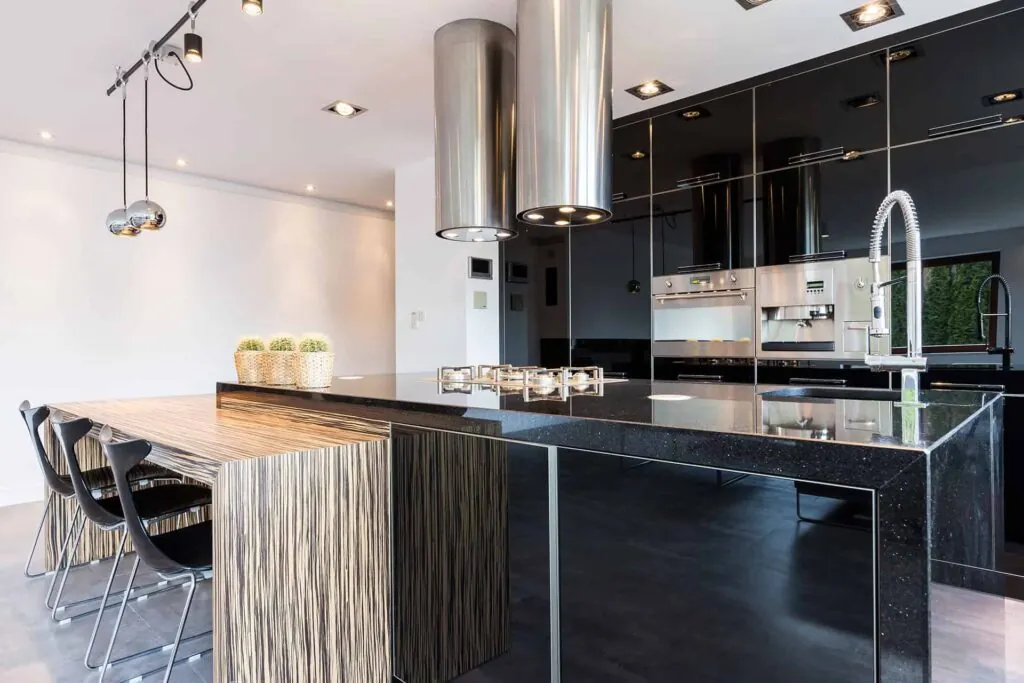 black kitchen cabinets with white walls