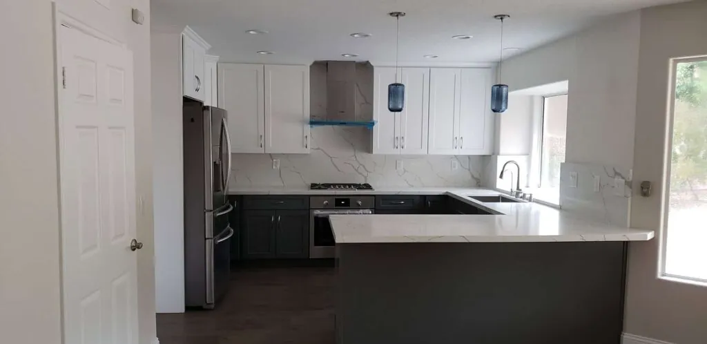 bright kitchen with wenge accents and marble