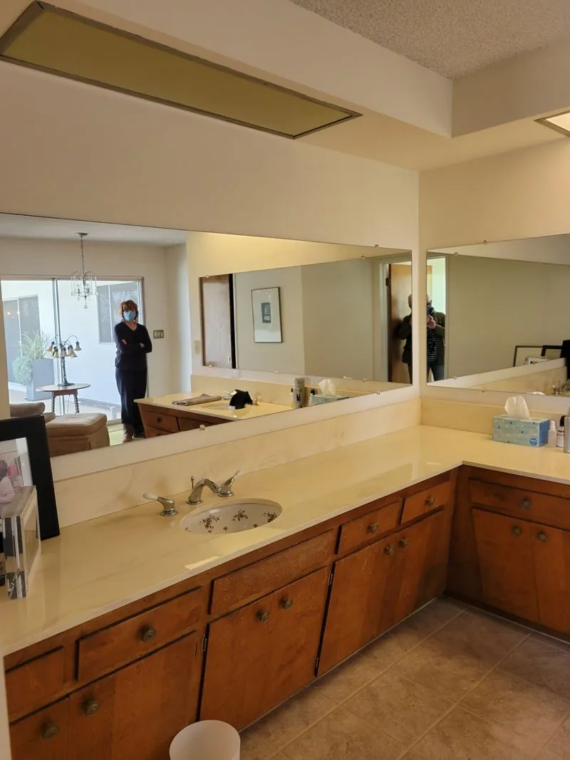 bathroom vanity with a large mirror