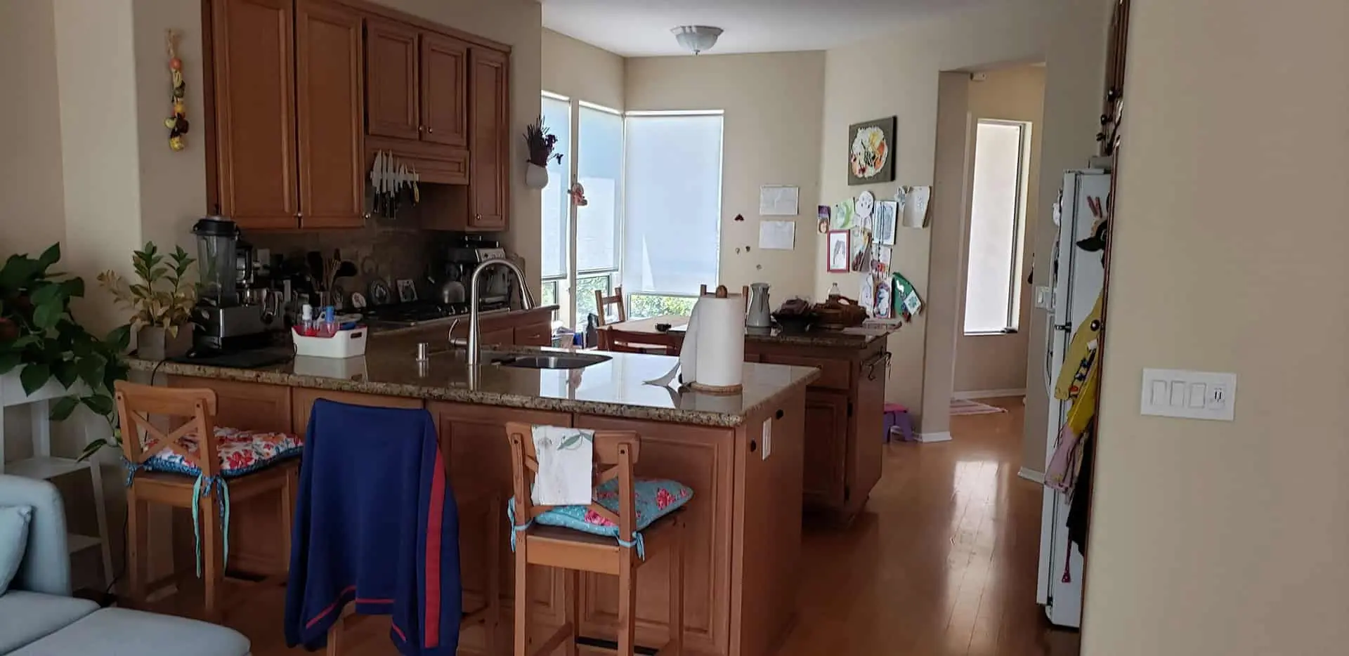 u-shaped kitchen with an imitation bar counter