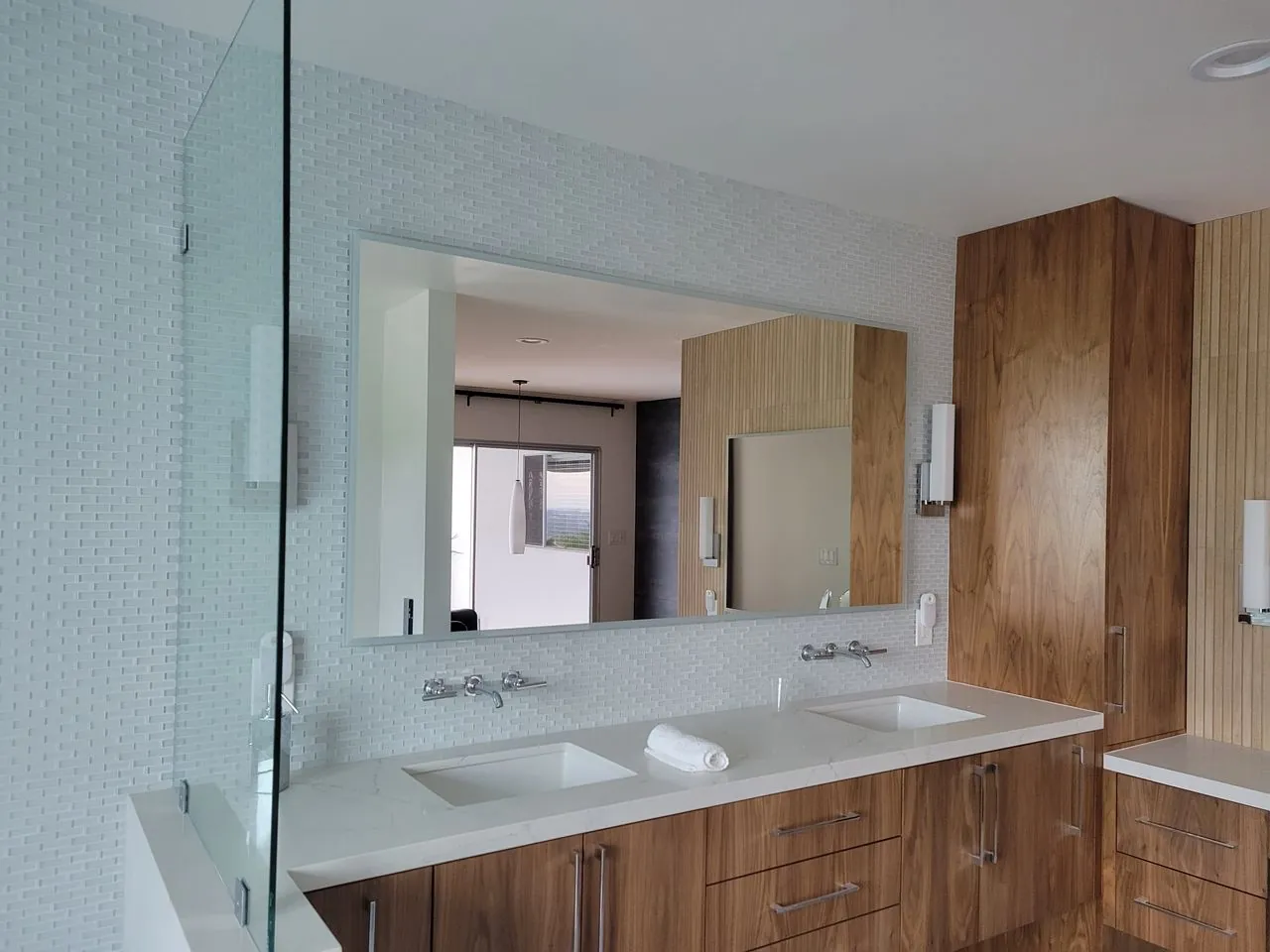 wooden cabinet fronts in the bathroom with double sinks