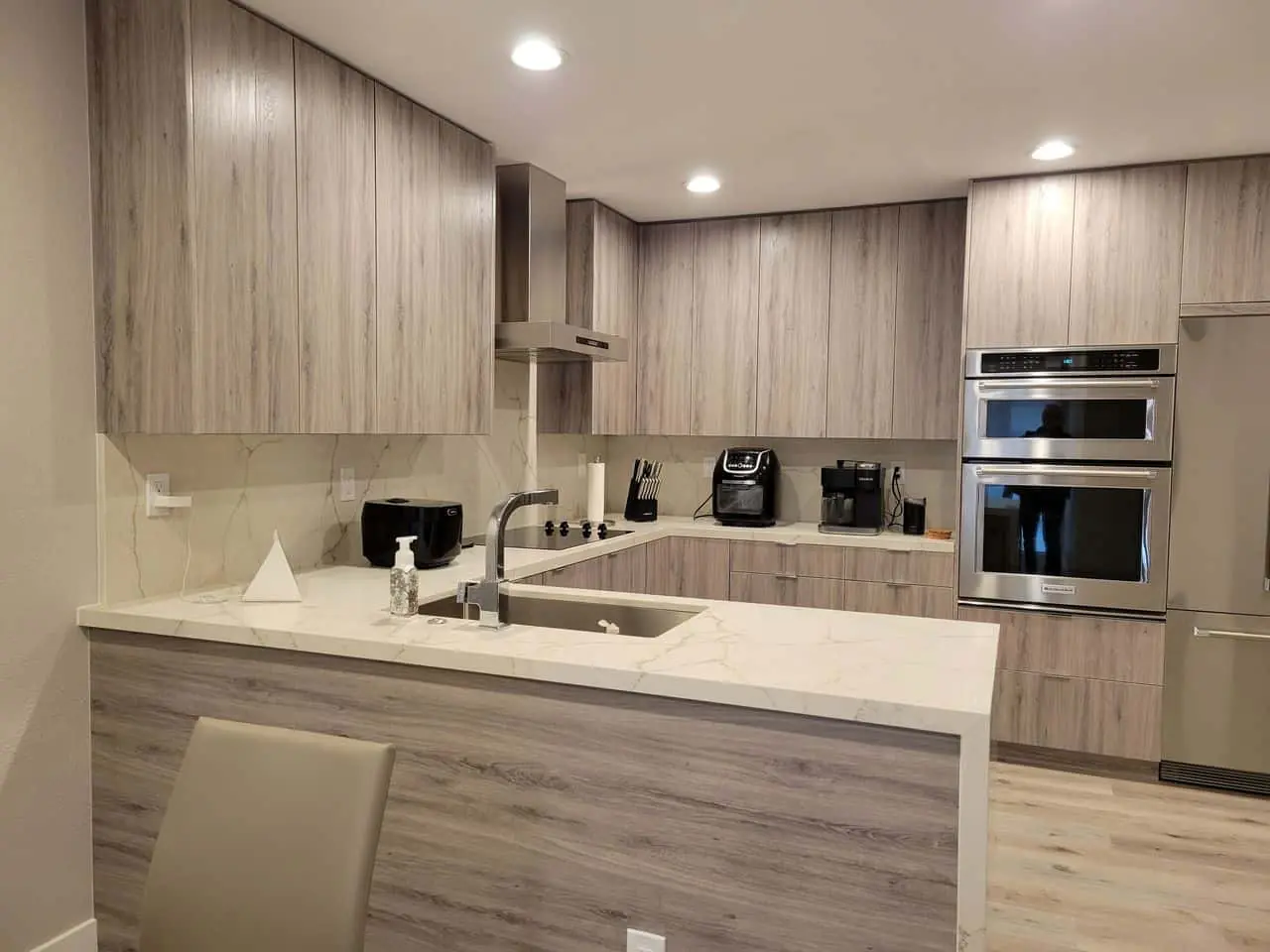 bright kitchen with light wood cabinets