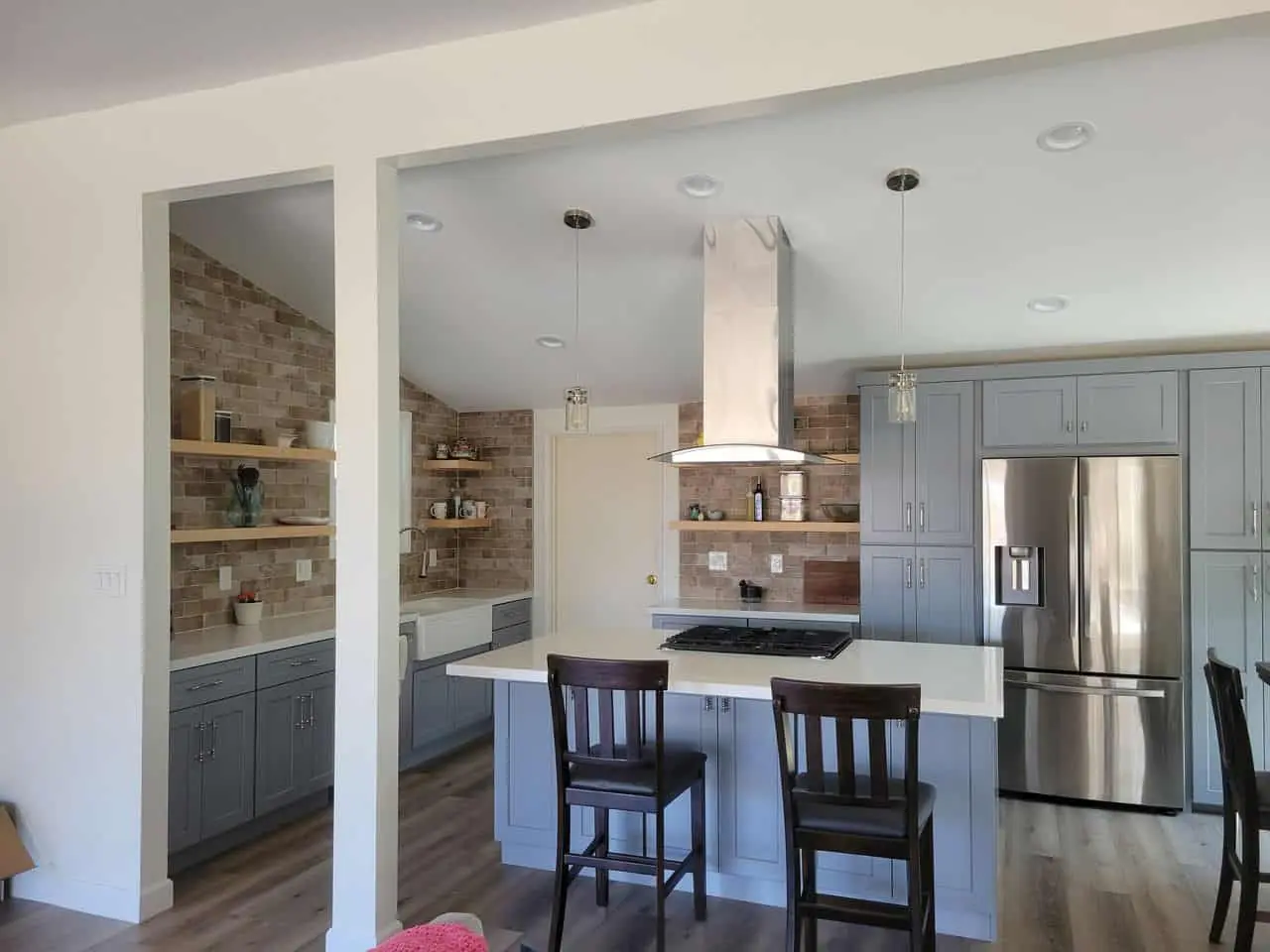 gray island in the middle of the kitchen