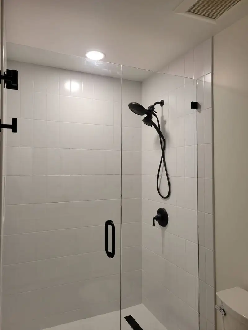 white shower with black hardware