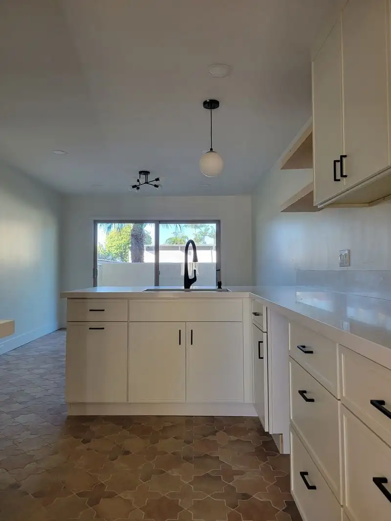 white kitchen with black hardware
