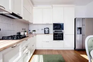 white l-shaped kitchen